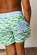 Load image into Gallery viewer, Citrus Bloom Swim Trunks by Swoon Baby
